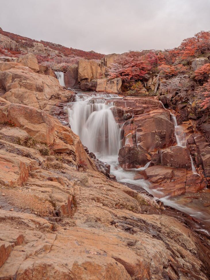 waterfall flowing on red rocks gunlock state park utah usa things to do in st. george utah